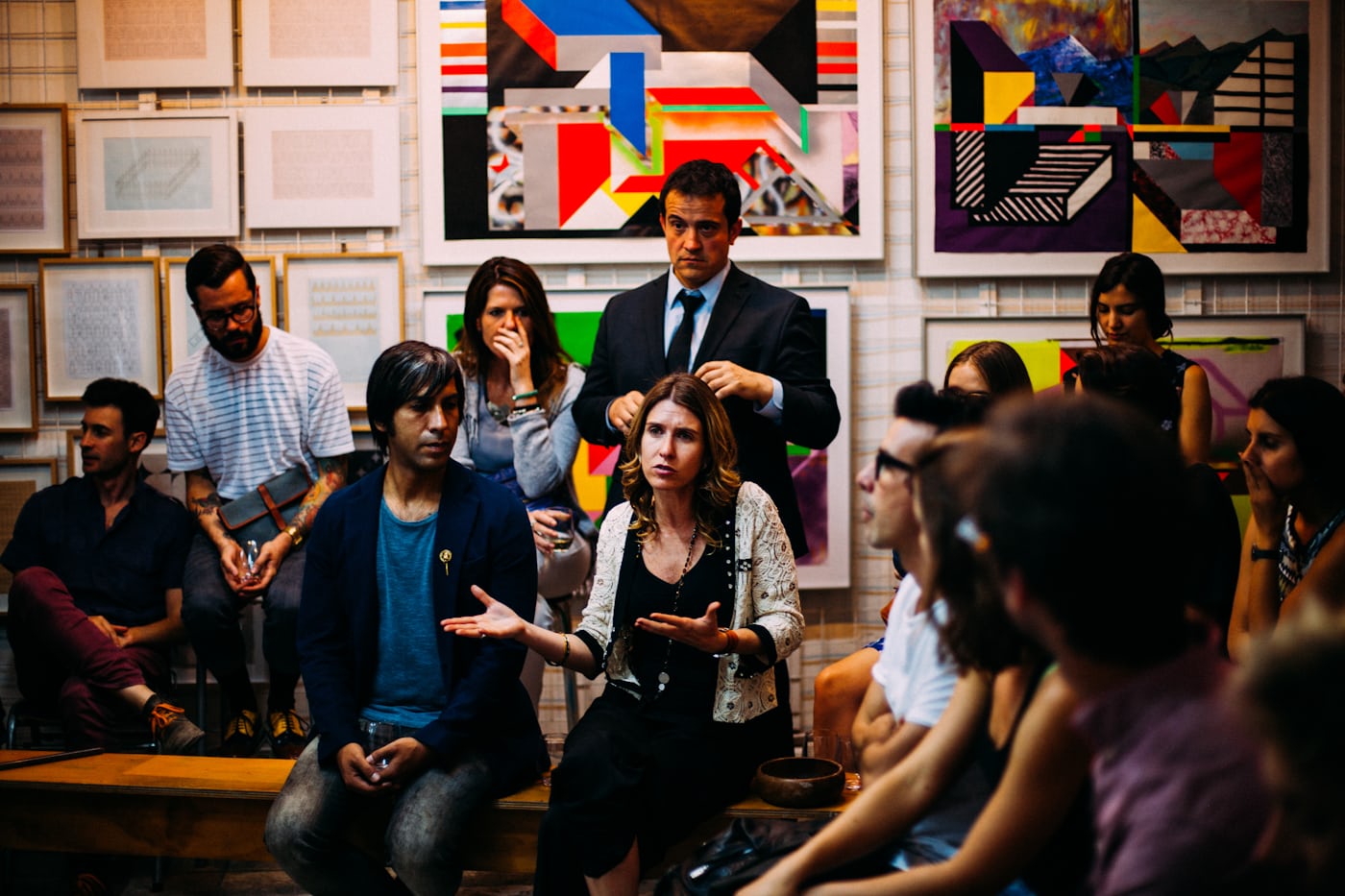 Professionals seated together in discussion at a gathering
