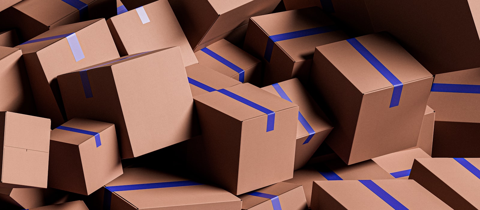 A heap of taped cardboard moving boxes