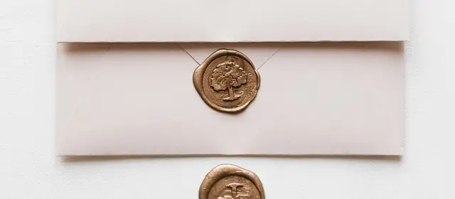 Pale envelopes closed with bronze wax seals